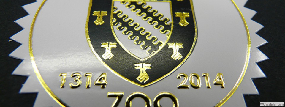 Exeter black gold embossed label