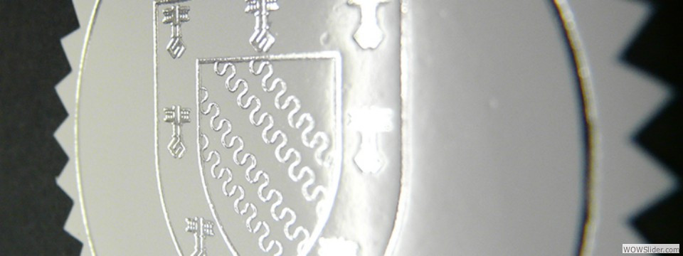 Exeter white silver embossed label