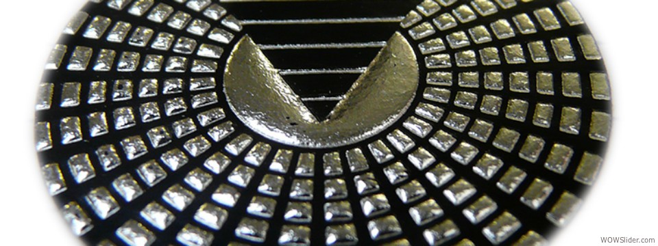 Silver pacman embossed label